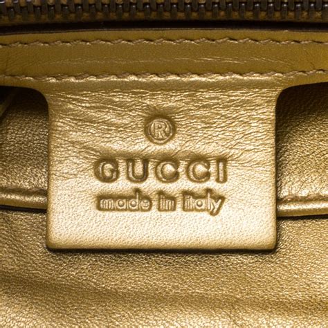 gucci bag counterfeit logo.